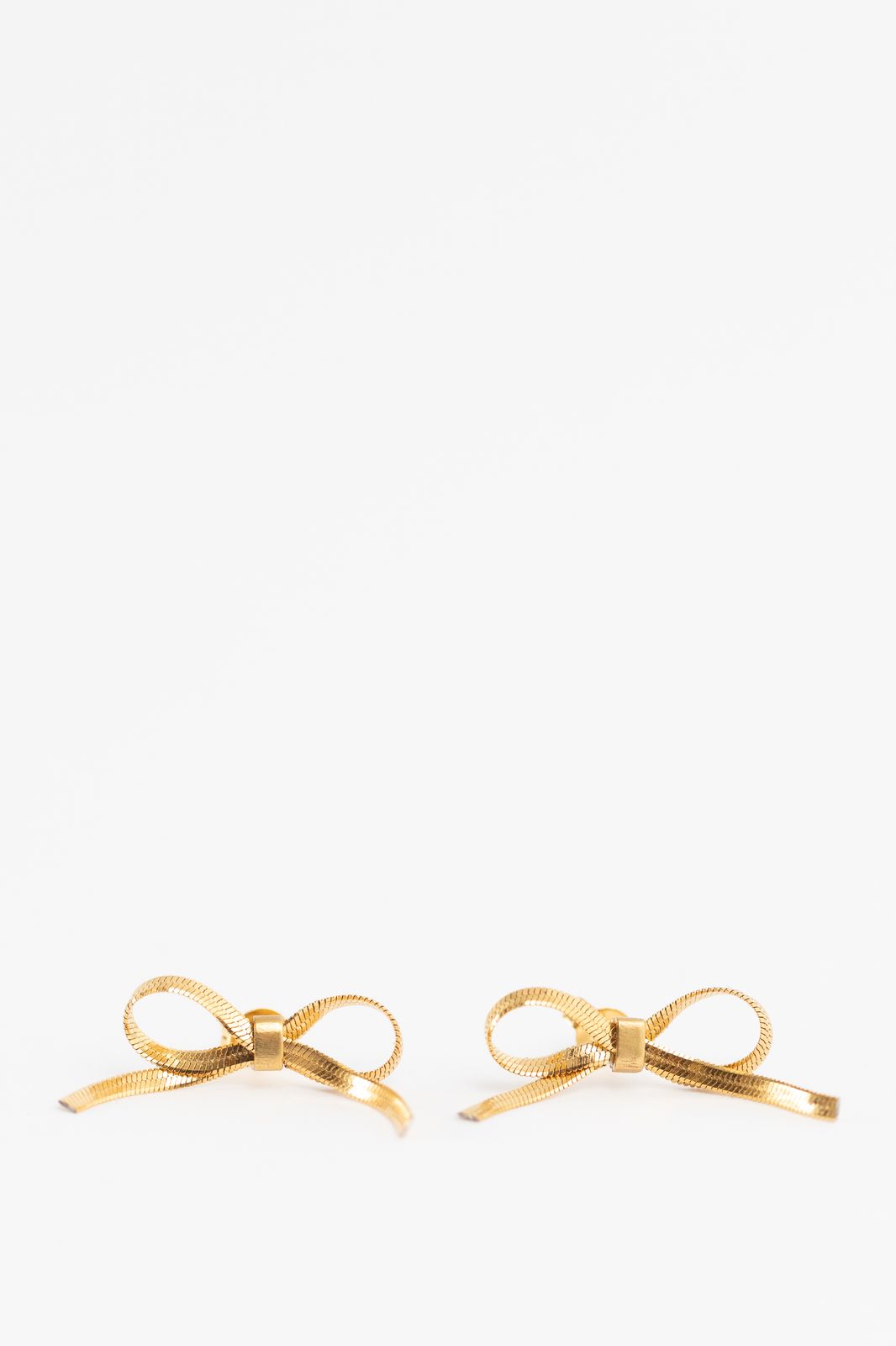Boucles d’oreille à clous avec nœuds - plaqué or