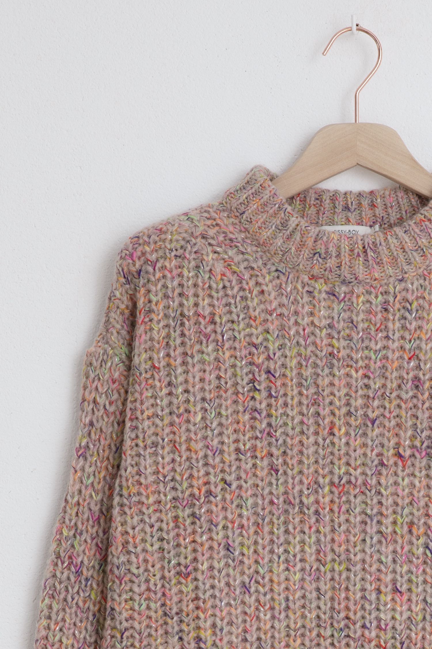 grof gebreide roze trui