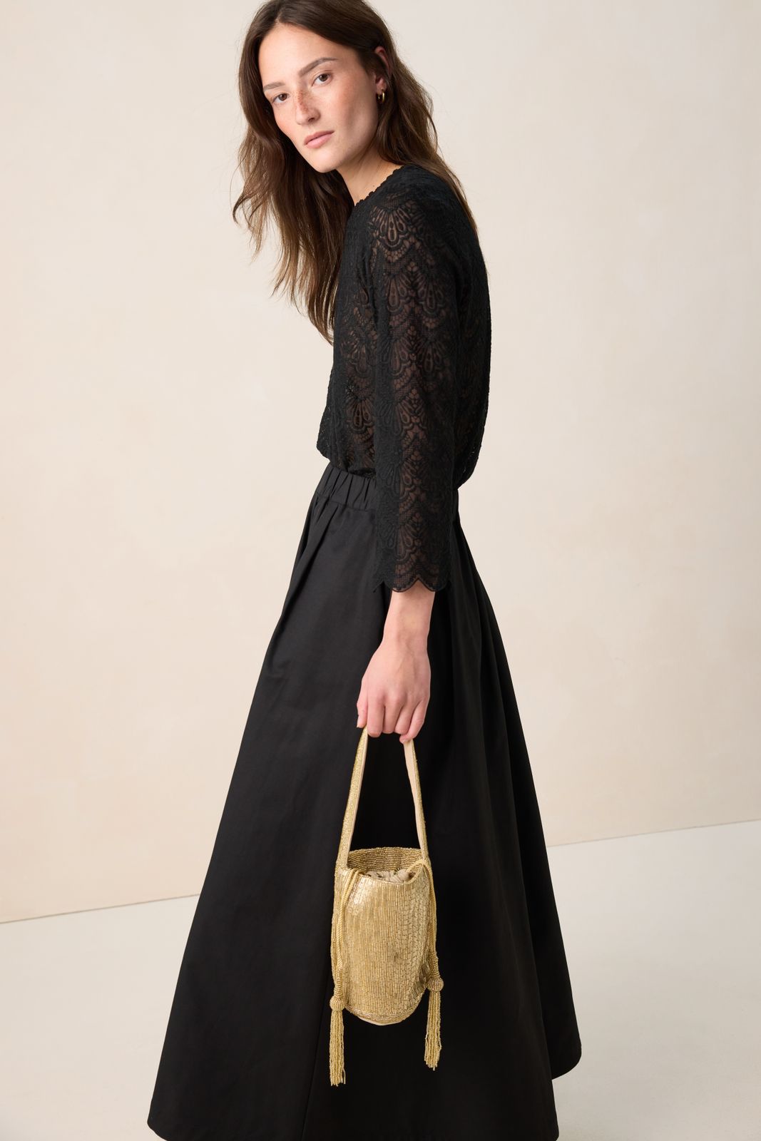 Schultertasche aus Perlen - goldfarben