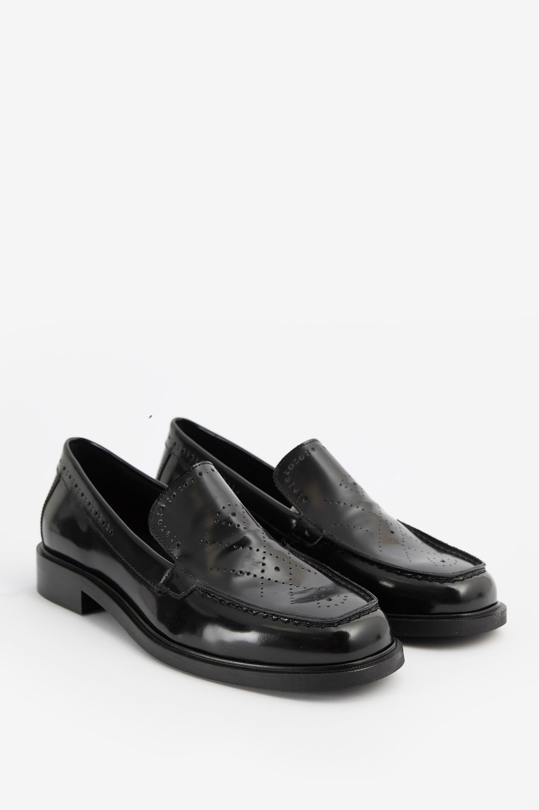 Loafers en cuir avec motif en relief - noir