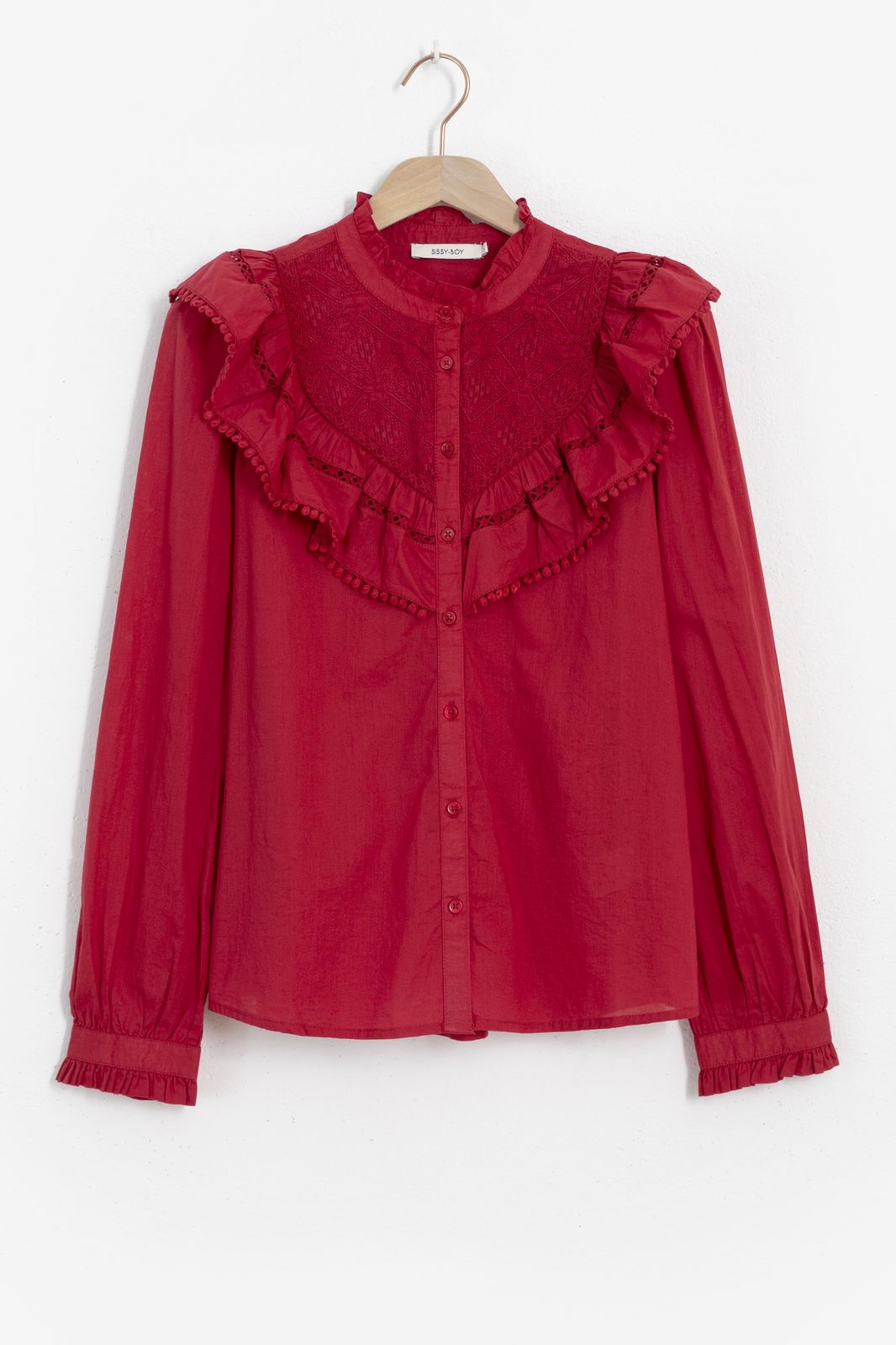 Rode blouse met kanten details en ruffles