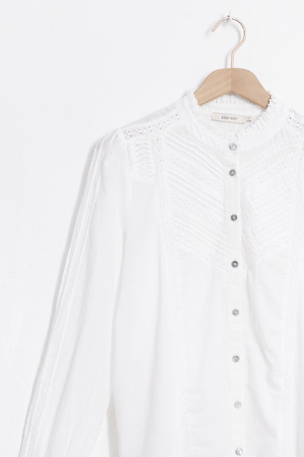 Witte blouse met ruffles