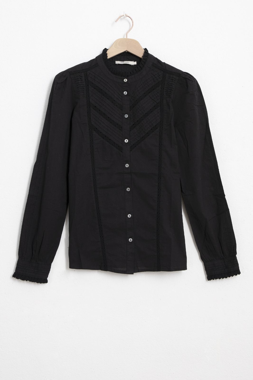 Zwarte blouse met ruffles
