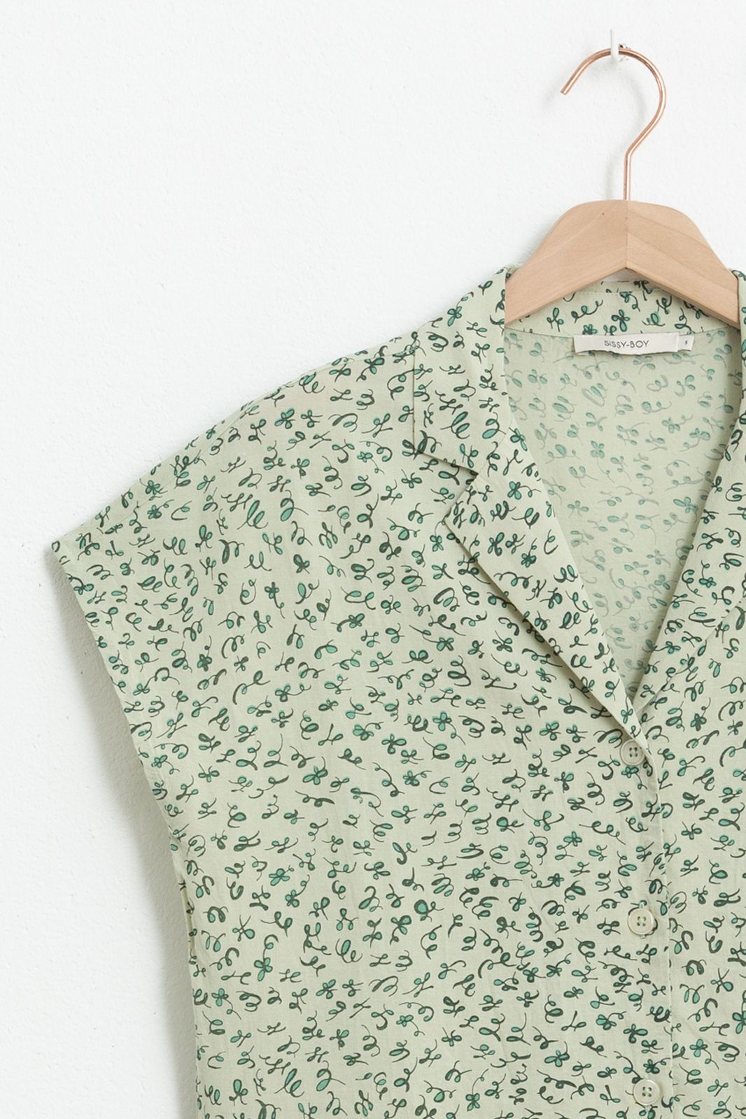 Groene blouse met all over print en korte mouwen