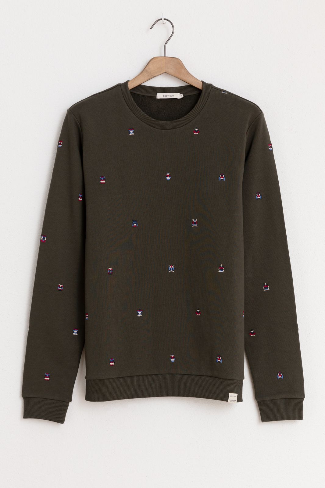 Dunkelgrüner Pullover mit Stickerei