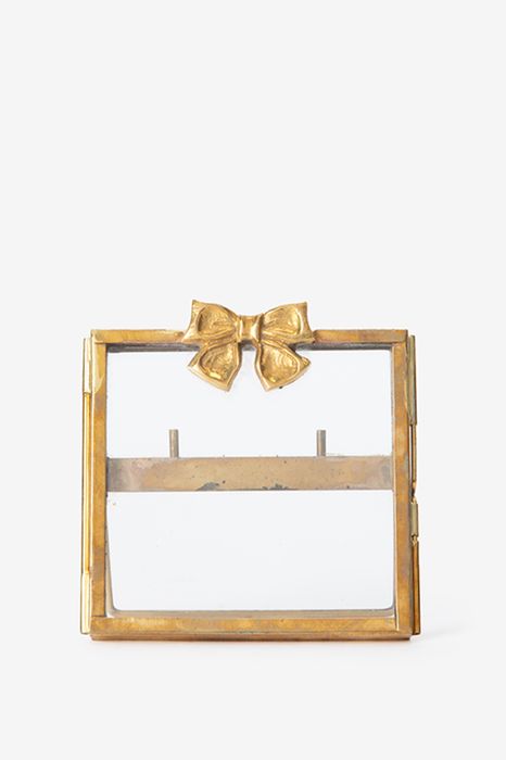 Goudkleurig fotolijstje met strik
