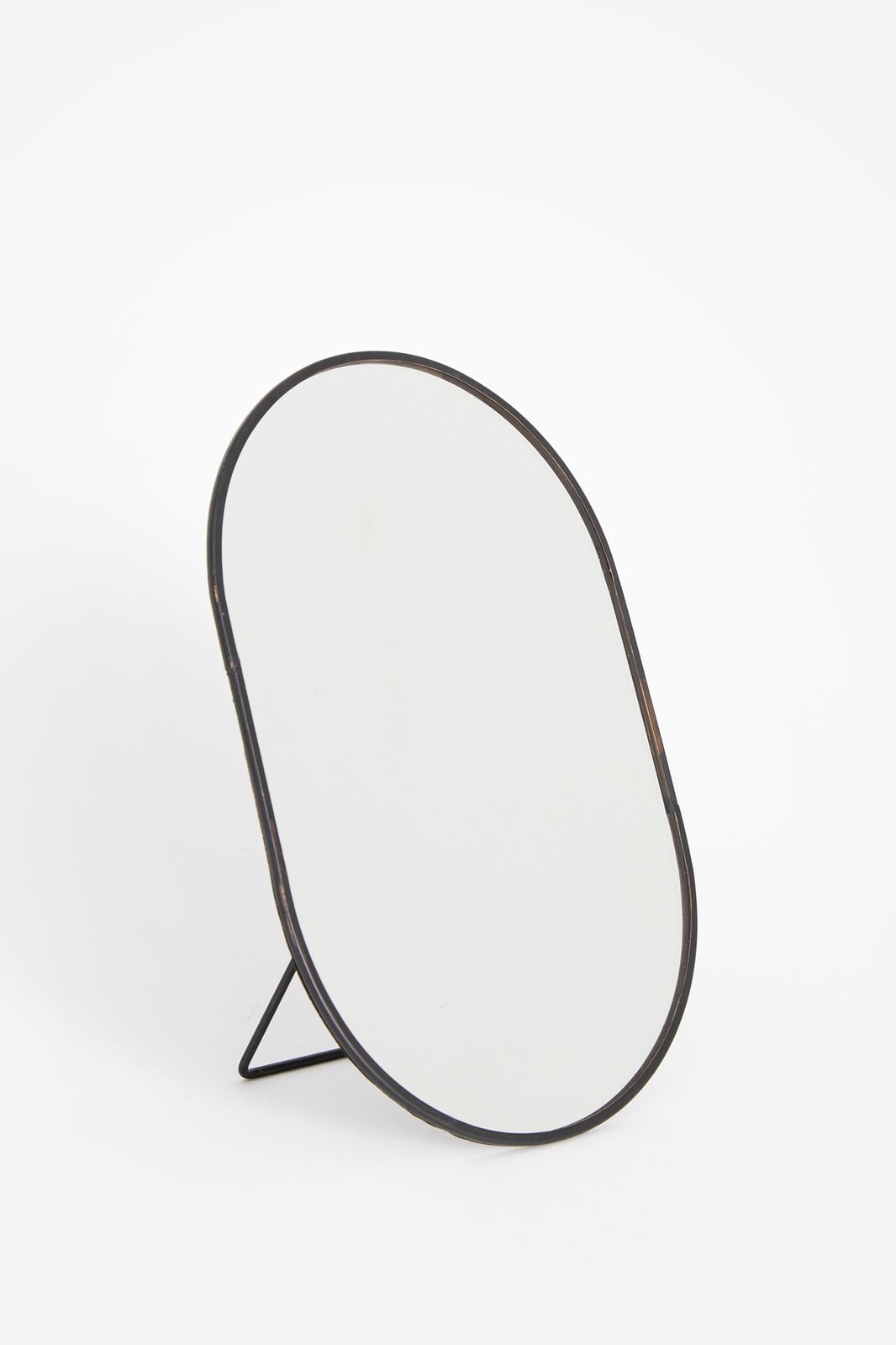 Zwarte ovale staande spiegel