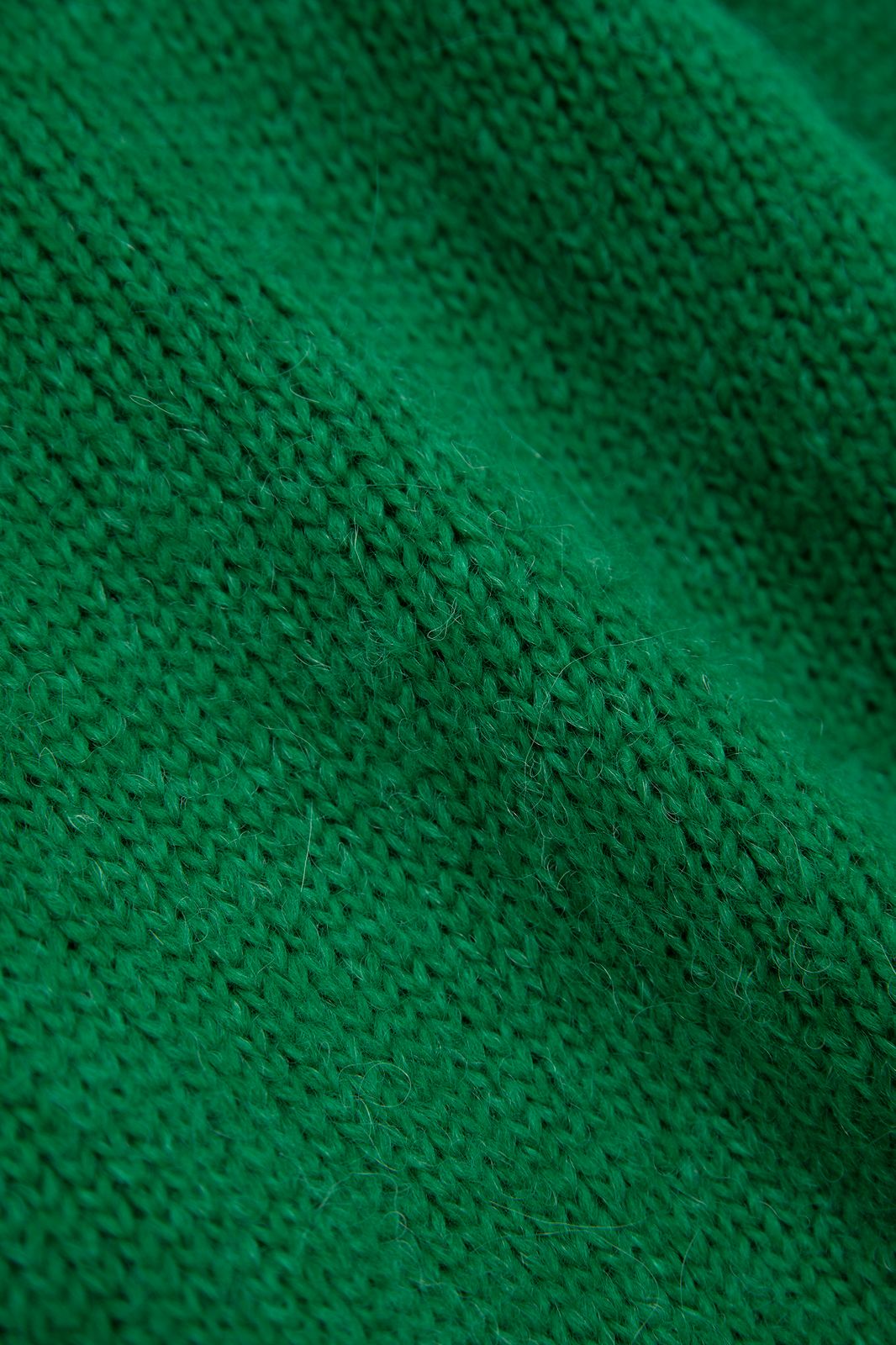 Groene gebreide trui