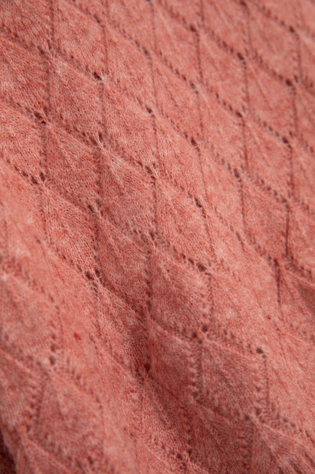 Roze ajour gebreide trui