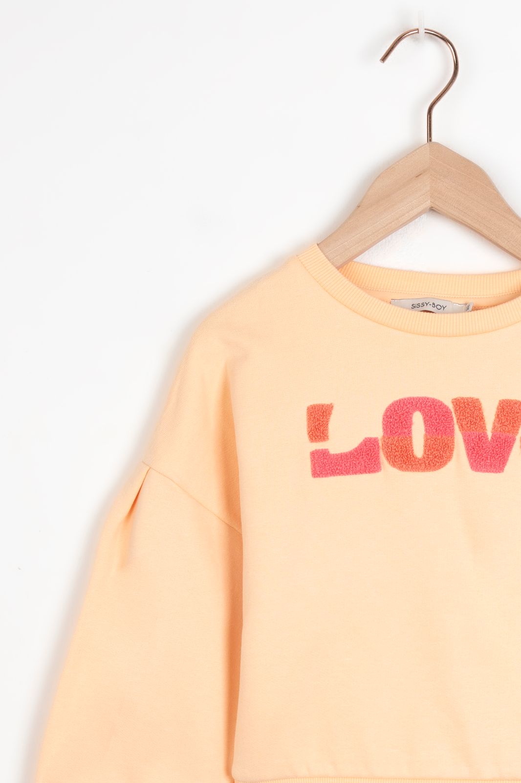 Sweater mit Schriftzug aus Nicki - aprikot