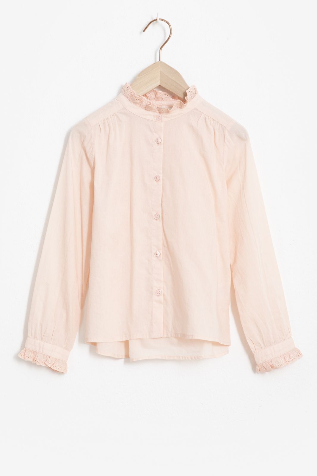 Roze katoenen blouse met ruffles