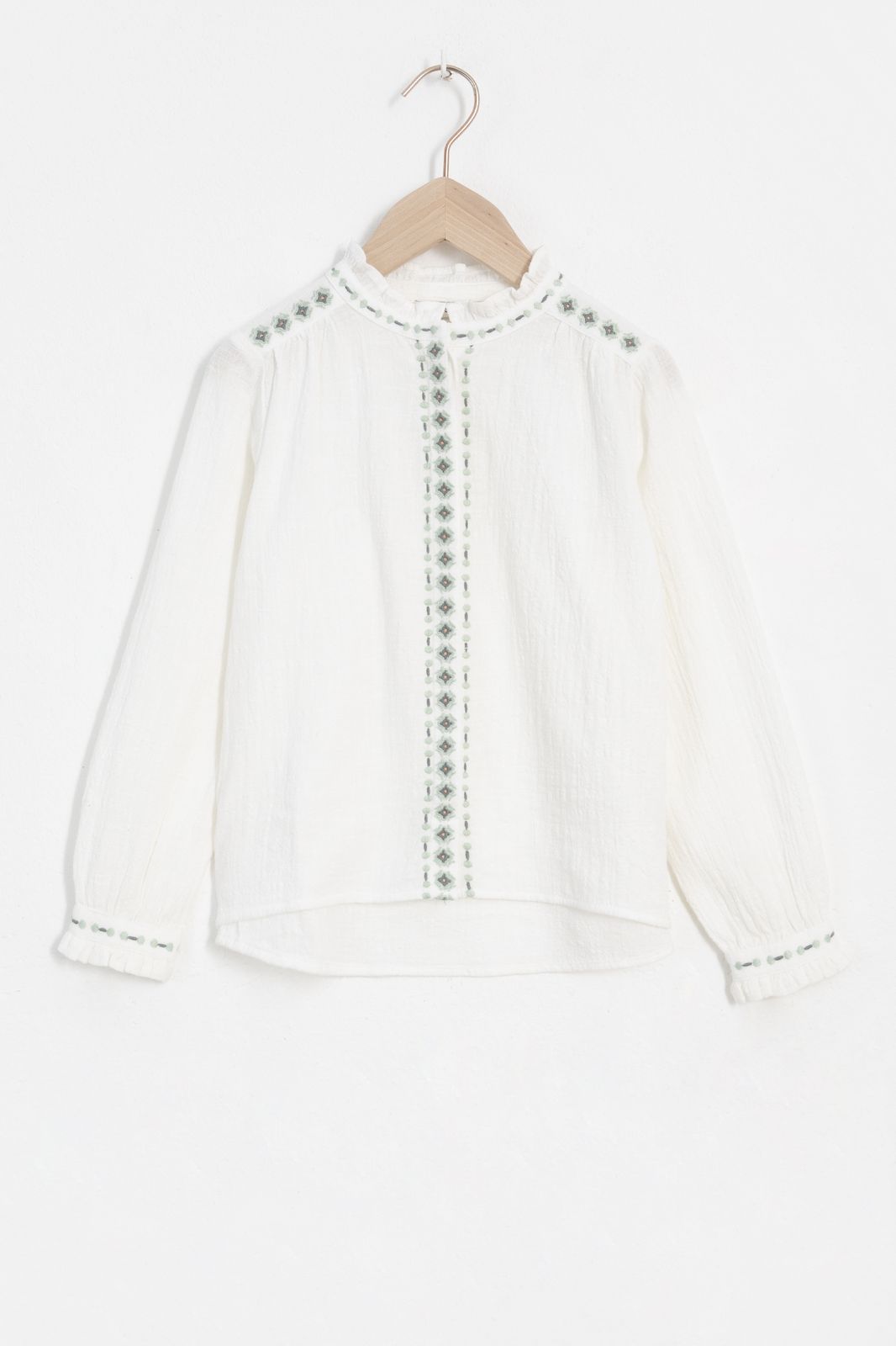 Witte blouse met borduursel